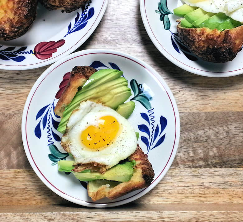 Picture of single Cheddar Popover Sandwich with Avocado and Fried Egg
